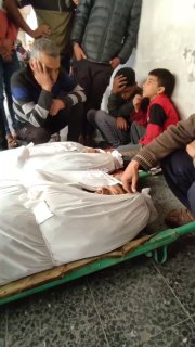 A sad morning at Baptist Hospital.. Farewell to the martyrs killed by the occupation in its raids on the Al-Shujaiya nei